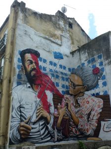 Missgeschick mit Selfie-Stick - Wandgemälde in Lissabon